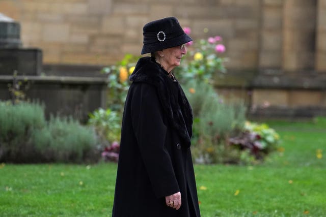 Sir Bobby's wife Norma Ball leaves Manchester Cathedral (Martin Rickett/PA)