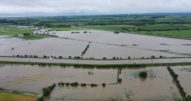 The River Steeping breaching its banks at Thorpe St Peter in Lincolnshire