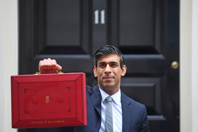 Chancellor of the Exchequer, Rishi Sunak, holds his ministerial ‘Red Box’ (Victoria Jones/PA)