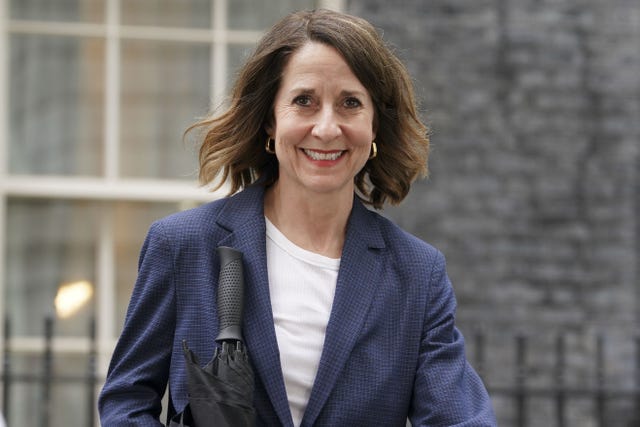 Liz Kendall smiles as she leaves 10 Downing Street