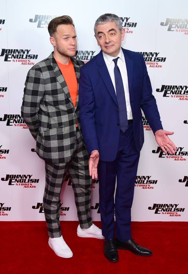 Olly Murs (left) and Rowan Atkinson on the red carper
