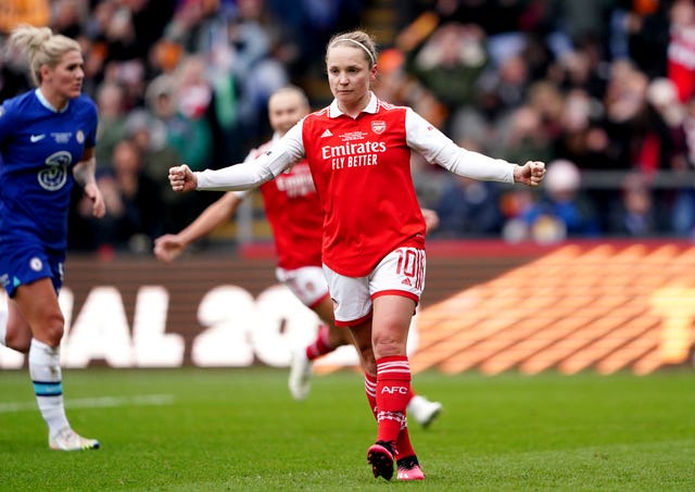 Arsenal’s Kim Little celebrates scoring from the spot