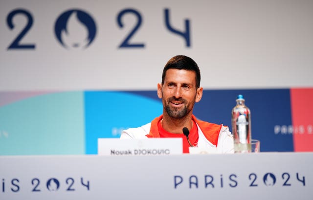 Djokovic speaking at a press conference