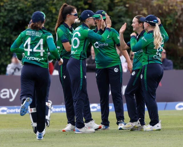 Ireland players celebrate after taking a wicket against England during the Women’s International T20 match at Castle Avenue, Dublin 