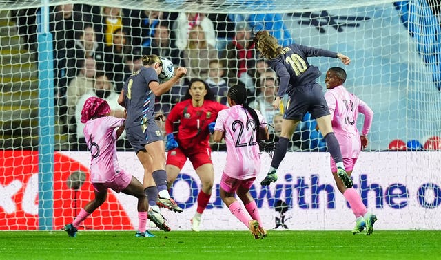 Grace Clinton, second left, heads home England’s second goal against South Africa