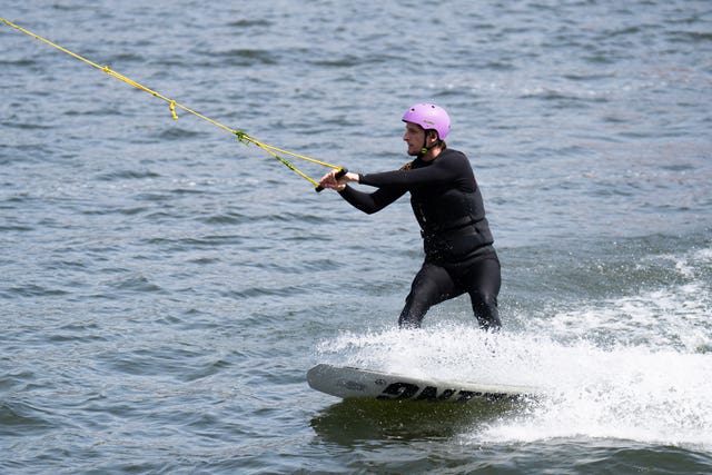 A man wakeboarding