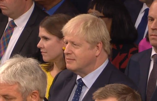 Prime Minister Boris Johnson listens to the speech 