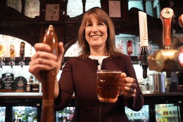 Rachel Reeves with a pint at the Goldsmith Arms pub in south-east London 