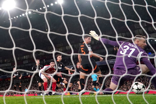 Shakhtar Donetsk goalkeeper Dmytro Riznyk, right, scores an own goal against Arsenal