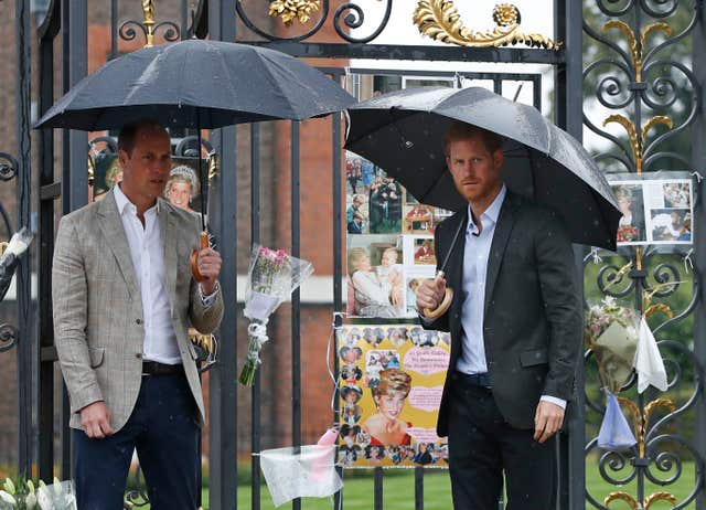 The Duke of Cambridge and Prince Harry after viewing tributes to Diana, Princess of Wales at Kensington Palace ahead of the 20th anniversary of their mother’s death (Kirsty Wigglesworth/PA)