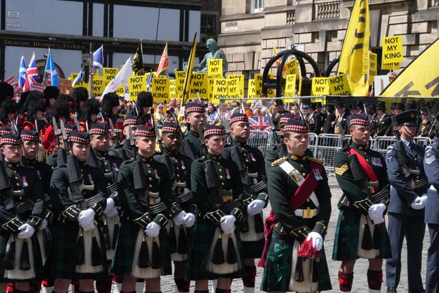 The Combined Cadet Force Pipes and Drums and the Cadet Military Band outside St Giles’ Cathedral