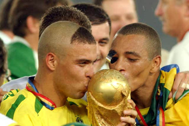 Ronaldo, pictured left, led Brazil to World Cup glory in 2002