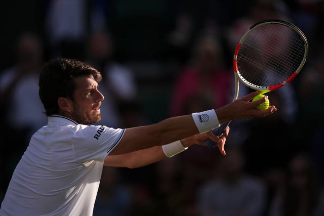 Cameron Norrie prepares to serve