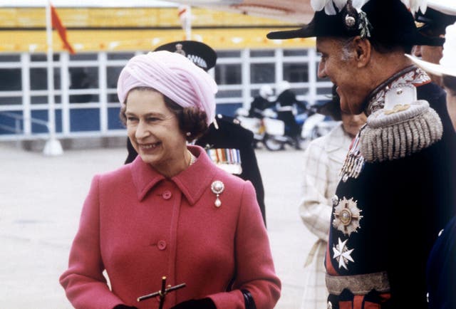 The Queen now favours wide brimmed hats, rather than the style she wore in the 1970s (PA) 