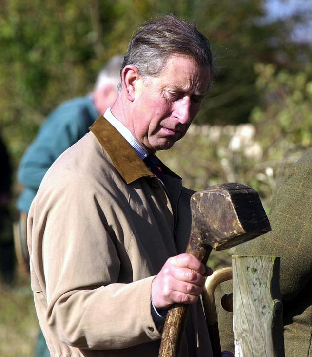 Charles pictured during a visit to the national hedge laying championships