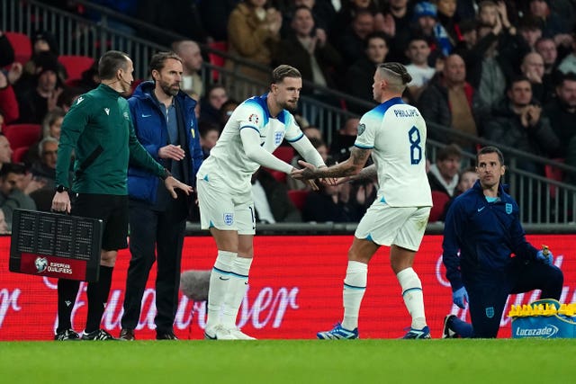 Jordan Henderson (left) is substituted on for Kalvin Phillips