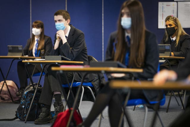 Over a dozen schools will be taking part in the pilot scheme to extend the academic day (Jane Barlow/PA)