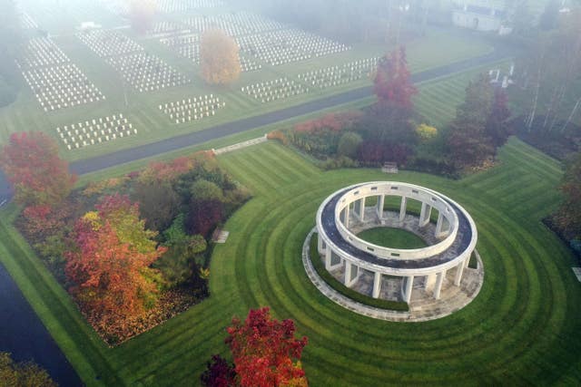 The early morning mist on Armistice Day over the 1939-1945 Memorial at the Commonwealth War Graves Commission’s Brookwood Military Cemetery in Woking, Surrey