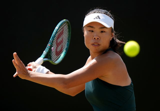 Mimi Xu prepares to hit a forehand