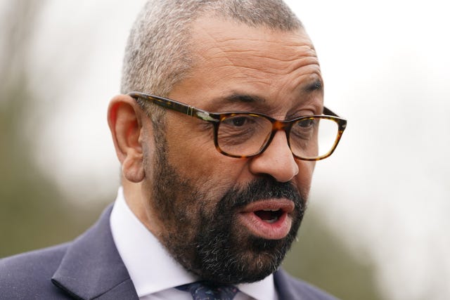 James Cleverly speaks to media during a visit to Sussex Police