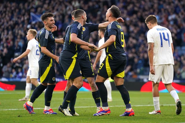 Scotland’s Lawrence Shankland (centre) celebrates scoring his side’s second goal of their 2-2 friendly against Finland