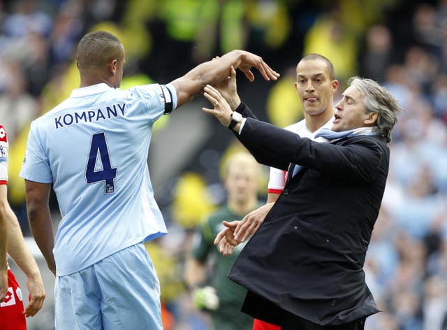 City manager Roberto Mancini (right) argued with players as the pressure increased
