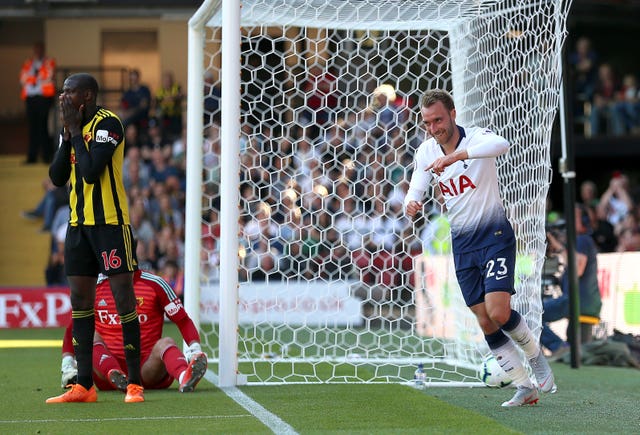 Christian Eriksen celebrates after an own goal by Abdoulaye Doucoure