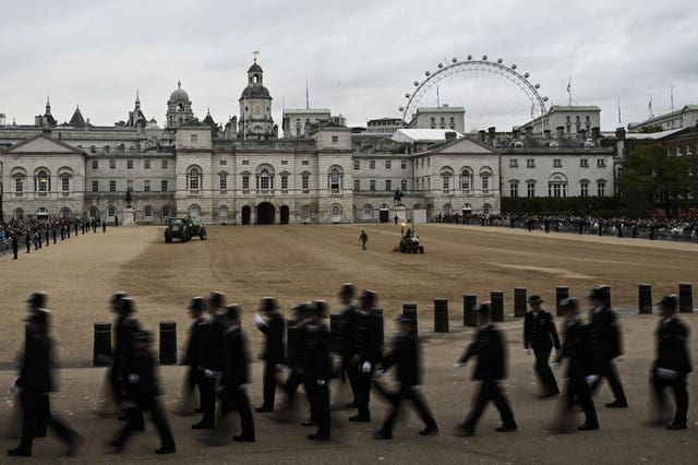 Police officers prepare on Horse Guards in London