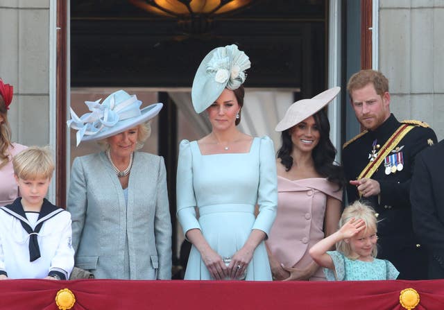Harry and Meghan as working royals on the Palace balcony with the royal family for the Trooping the Colour celebrations