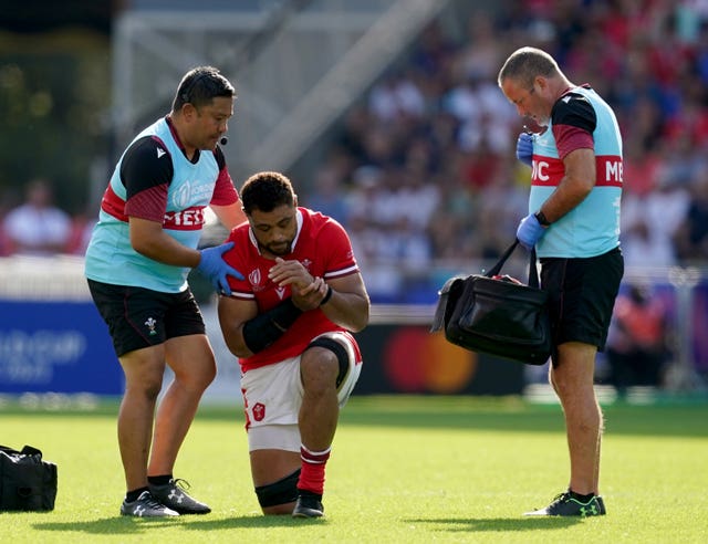 Taulupe Faletau is injured against Georgia at the 2023 World Cup 