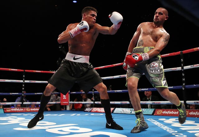 Anthony Ogogo (left) suffered an eye injury in defeat to Craig Cunningham.