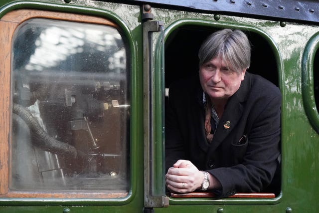Poet Laureate Simon Armitage on board Flying Scotsman during an event at Edinburgh Waverley station to mark the day the world famous locomotive, Flying Scotsman, entered service on February 24 1923