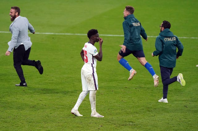 Bukayo Saka is dejected after missing in the Euro 2020 final penalty shoot-out against Italy