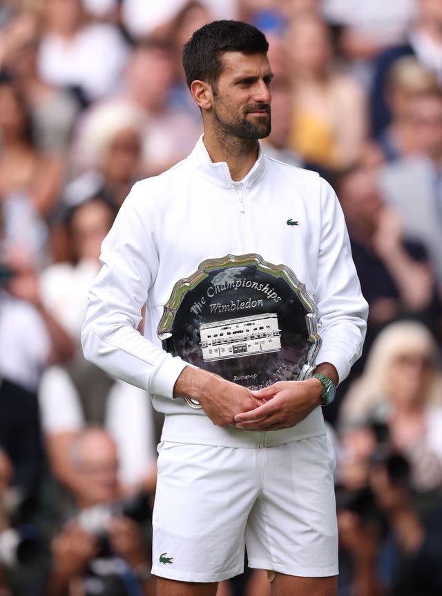 Novak Djokovic with the runners-up trophy at Wimbledon last summer
