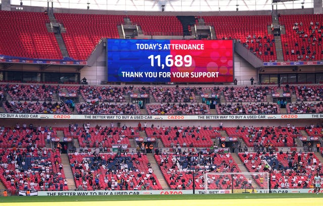 A big screen displays the match attendance of 11,689 thanking fans for their support during the Sky Bet Championship play-off final at Wembley