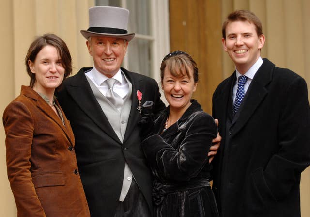 BBC Radio 2 veteran DJ Johnnie Walker with his third wife Tiggy at the Royal Investitures