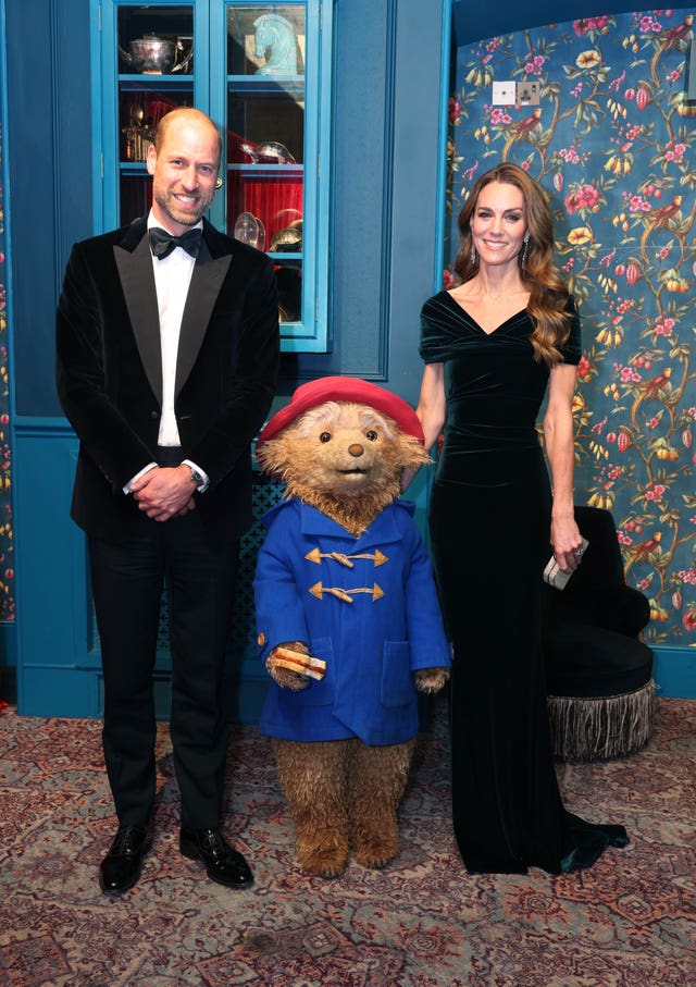 The Prince and Princess of Wales pose for a photo with Paddington Bear from the Paddington musical at last year's event 
