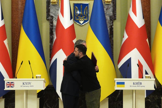 Sir Keir Starmer embraces Volodymyr Zelensky