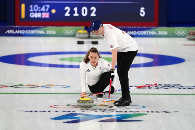 Great Britain’s Jennifer Dodds, left, and Bruce Mouat in action during the curling mixed doubles fixture against Sweden