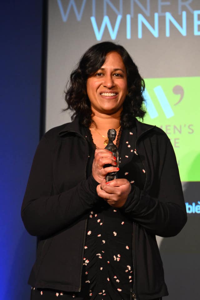 VV Ganeshananthan poses with her trophy after being announced as the winner of the 2024 Women's Prize for Fiction