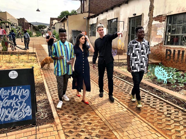 The Duchess of Sussex visiting Victoria Yards, a regeneration project that is home to design studios, art galleries and a popular monthly food market in Johannesburg, South Africa