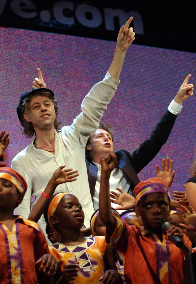 Bob Geldof onstage with Paul McCartney at a Live 8 concert in Hyde Park 