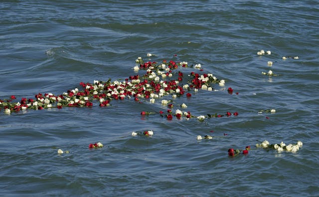 A view of the 500 flowers which were cast into the sea