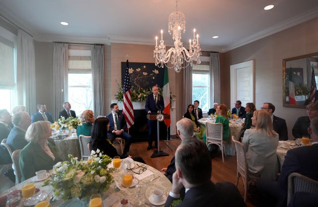 US vice president JD Vance (centre left) watches as Taoiseach Micheal Martin speaks during a breakfast at the Naval Observatory