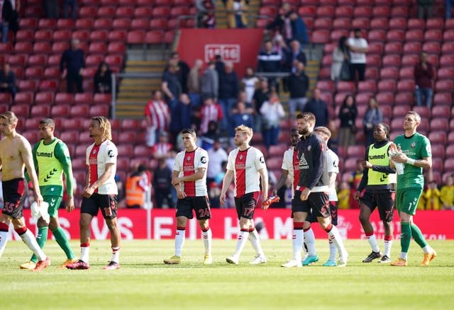 Southampton's players applaud fans after their relegation was confirmed by a tame 2-0 defeat to Fulham. Saints' fate was sealed with two fixtures of a dismal season to spare. The south-coast club had three managers in charge across the campaign - Ralph Hasenhuttl, Nathan Jones and Ruben Selles - but spent the majority of it in the drop zone. Southampton-born Prime Minister Rishi Sunak was among the crowd at St Mary's for the visit of the Cottagers and witnessed a team lacking confidence, ideas and urgency produce another feeble performance
