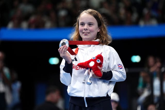 Great Britain’s Iona Winnifrith holds her silver medal after the women’s 100m breaststroke SB7 medal ceremony