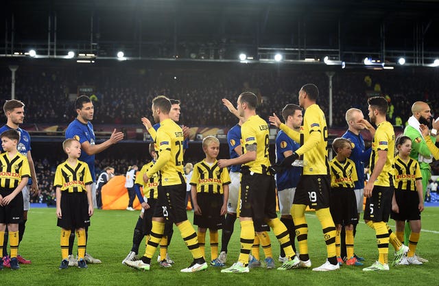 Everton and BSC Young Boys players shake hands prior to a Europa League match in 2015