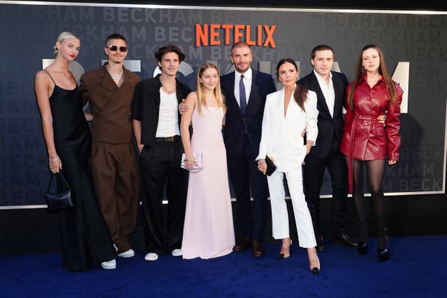 The Beckham family posing for a photo