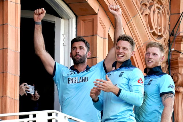 England players celebrate on the balcony at Lord's