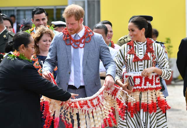 The couple were presented with a ta’ovala, a traditional Tongan dress, which was wrapped around their waists